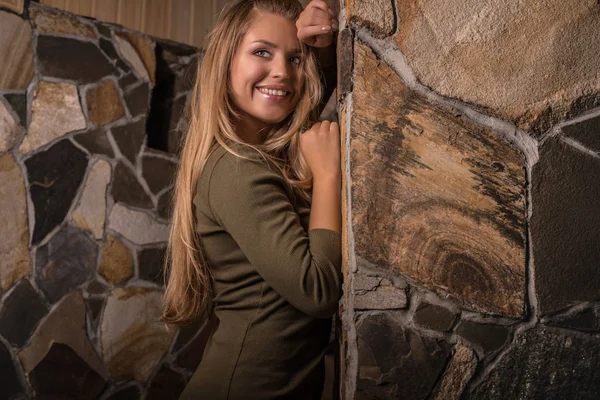 Young beauty woman against house interior. — Stock Photo, Image