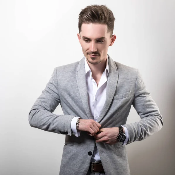 Handsome Young Elegant Man Grey Jacket Pose Studio Background — Stock Photo, Image