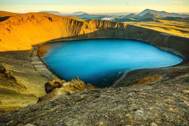 Volcanic lakes of Iceland. Scenic landscape at sunset. clipart