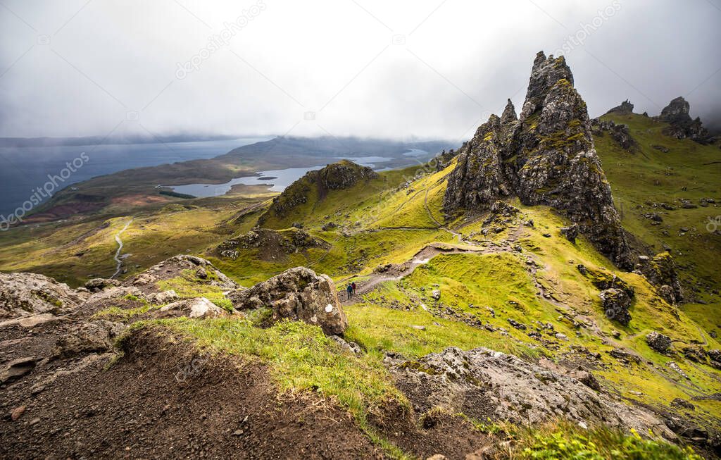 Old Man of Storr on the Isle of Skye in Scotland. Mountain landscape with foggy clouds.