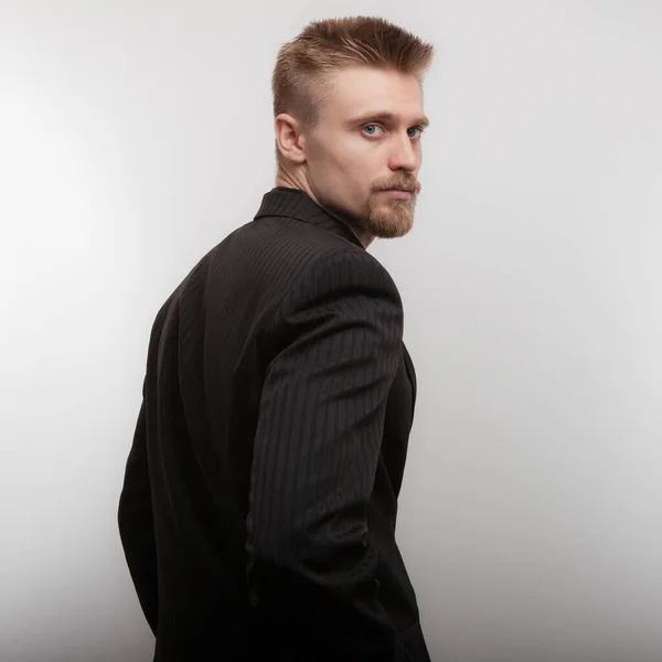 Handsome young elegant man studio portrait. — Stock Photo, Image