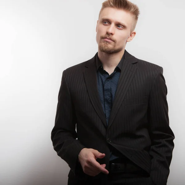 Handsome young elegant man studio portrait. — Stock Photo, Image