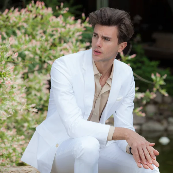 Young elegant handsome man posing outside. — Stock Photo, Image