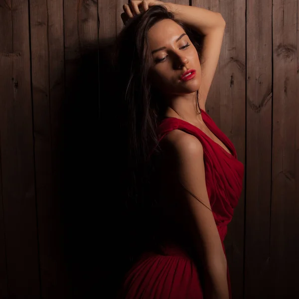 Portrait of beautiful young girl on wooden background. — 스톡 사진