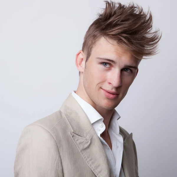 Handsome young elegant man studio portrait. Stock Image