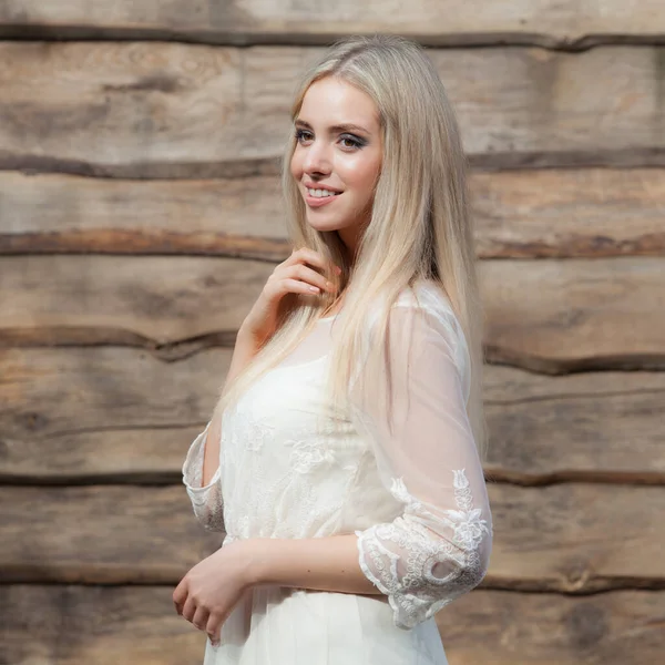 Portrait of beautiful young girl on wooden background. — 스톡 사진