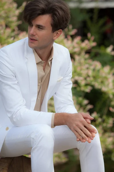 Young elegant handsome man posing outside. — Stock Photo, Image