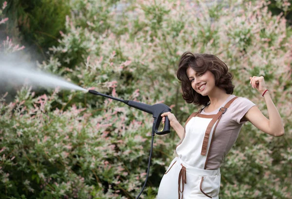 Portrait of beautiful young girl in summer garden. — Stock Photo, Image