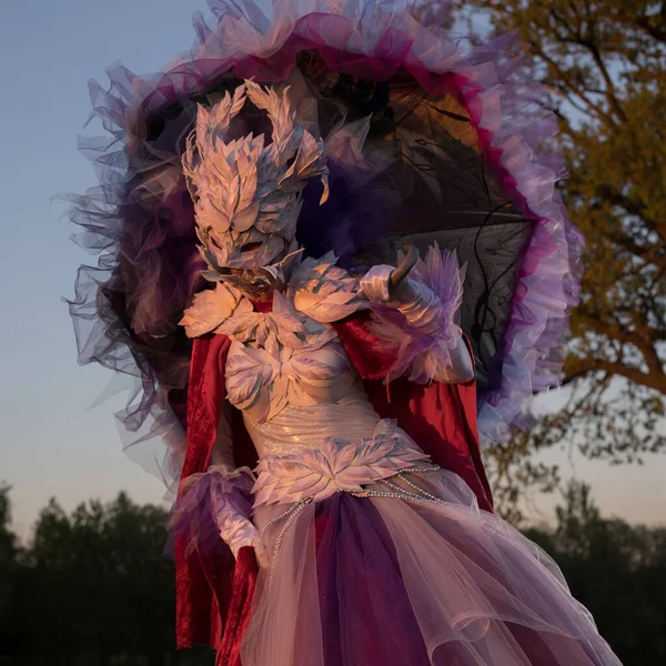 Fairy tale woman on stilts in bright fantasy stylization. — Stock Photo, Image