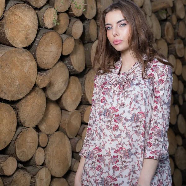 Portrait of beautiful young girl on wooden background. — 스톡 사진