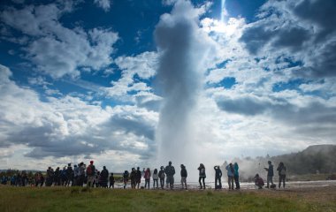 REYKJAVIK, ICELAND - AUGUST 29, 2017: Icelandic geyser vapors and picturesque nature.