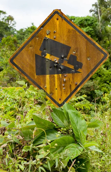 Old yellow rusted steep grade hill traffic sign. — Stock Photo, Image