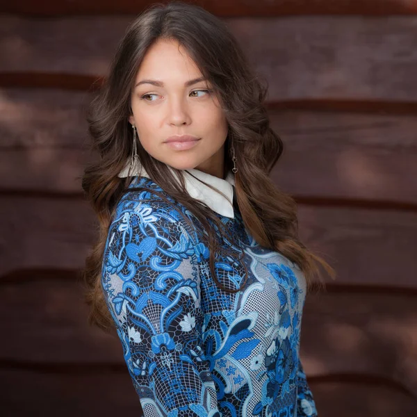 Portrait of beautiful young girl on wooden background. — 스톡 사진