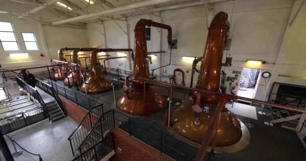 SCOTLAND, UNITED KINGDOM - May 30, 2019: Scottish traditional distillery producing alcoholic beverages . — стоковое видео
