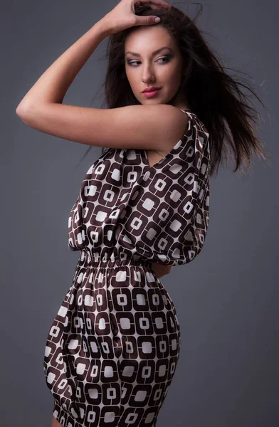 Young beautiful stylish girl posing in studio. — Stock Photo, Image