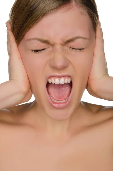 Beautiful emotional woman covers her ears with her hands — Stock Photo, Image