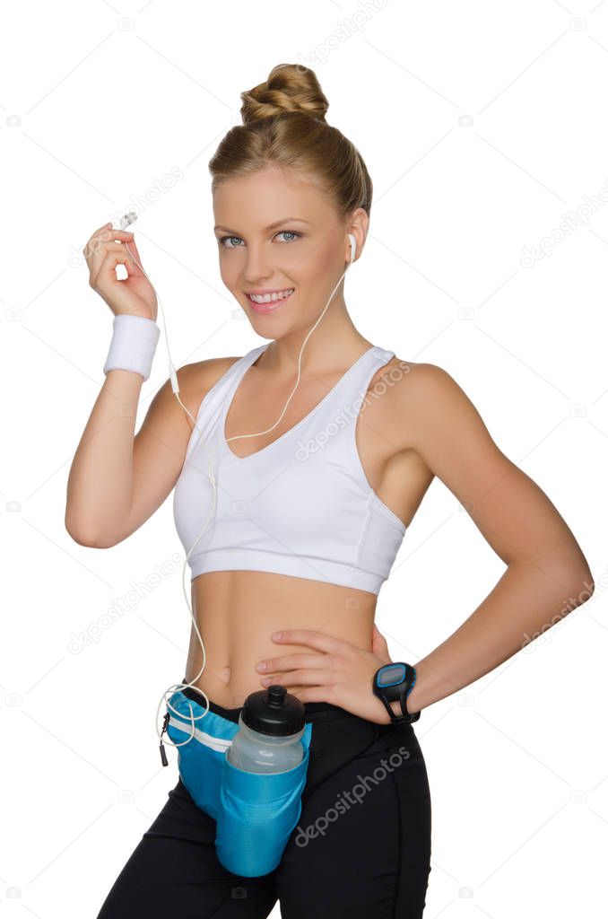 Happy woman in clothes and with accessories for playing sports