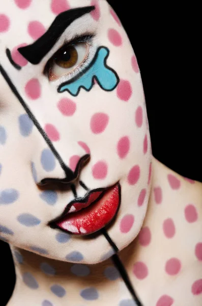 Mulher com arte facial no rosto — Fotografia de Stock