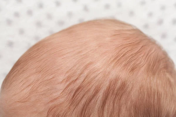 Cabeza de bebé de cerca — Foto de Stock