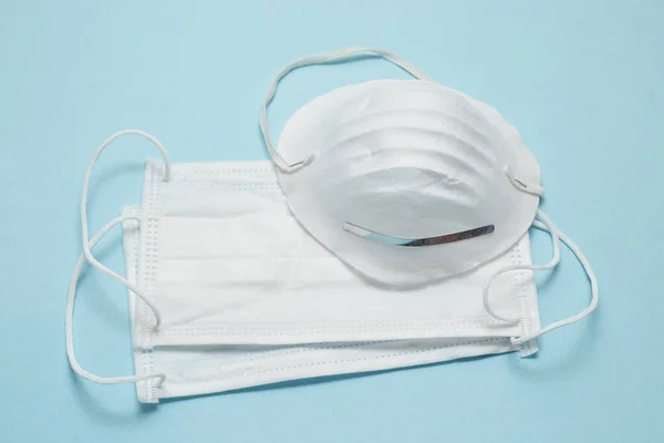 Disposable surgical face mask cover the mouth and nose. Healthcare and medical concept. Protect from Covid-19, Coronavirus, 2019-ncov, corona-virus. Can help protect wearers from getting others sick through their spit. Also for sick people and careta
