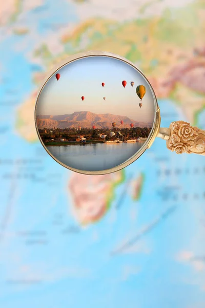 Luxor balloons at dawn with magnifying glass — Stock Photo, Image