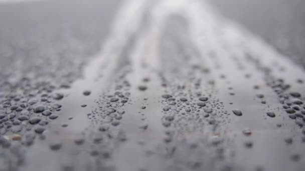 Raindrops of white water falling down on glass. Perfect for digital composing. Pure black background — Stock Video