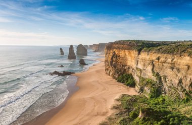 The Twelve Apostles Rocks on the ocean, Great Ocean Road at suns clipart