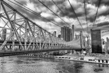 Queensboro Bridge, New York City on a cloudy day clipart