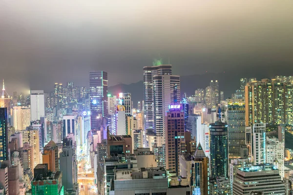 HONG KONG - APRIL 2014: Panorama of Hong Kong at night. With a l — Stock Photo, Image