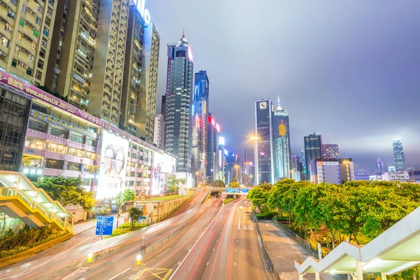 HONG KONG - APRIL 2014: Panorama of Hong Kong at night. With a l — Stock Photo, Image