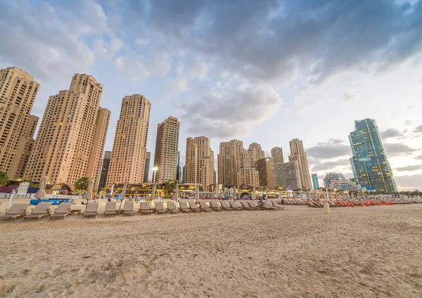 Dubai Marina skyline from the beach at sunset — Stock Photo, Image