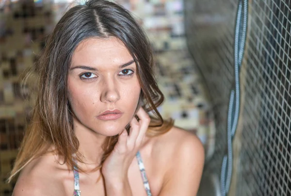 Beautiful girl inside sauna room in spa center — Stock Photo, Image