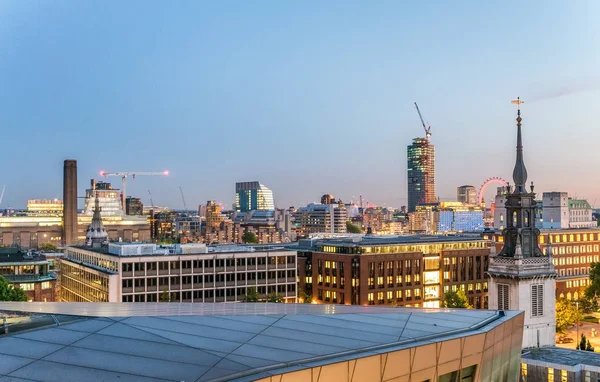 London skyline at sunset from rooftop, UK — Stock Photo, Image