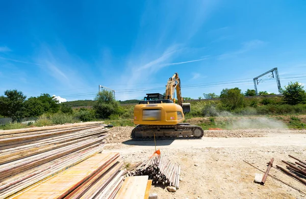 Digger in contruction bouwplaats — Stockfoto