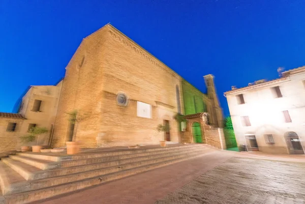 Blurred view of San Gimignano architecture at sunset, Tuscany - — Stock Photo, Image