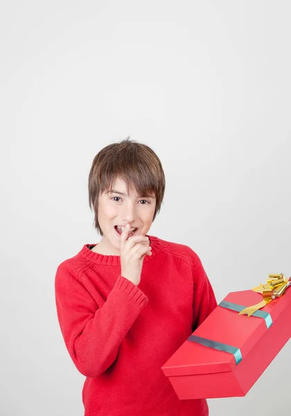 Opening Christmas gift — Stock Photo, Image