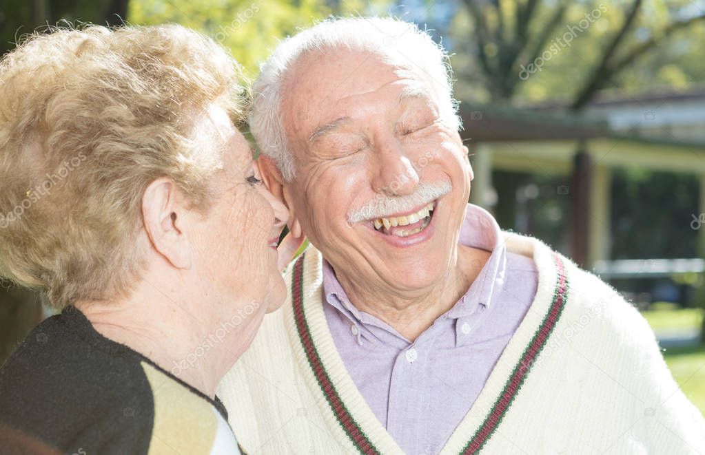 Elderly couple in the garden