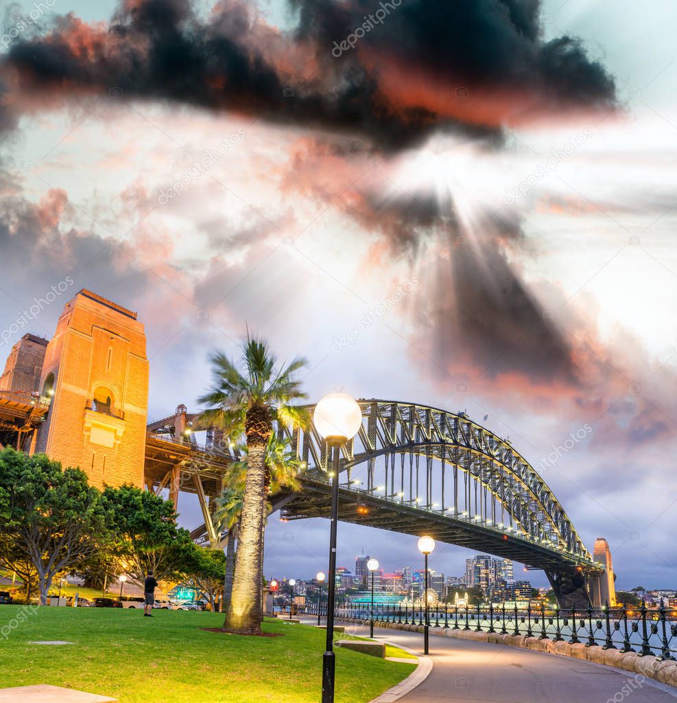 Beautiful view of Sydney Harbour Bridge with sunset sky, Austral