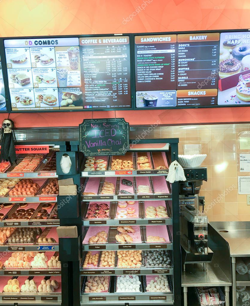 BOSTON - OCTOBER 2015: Dunkin Donuts shop interior. It is a major company serving breakfast.