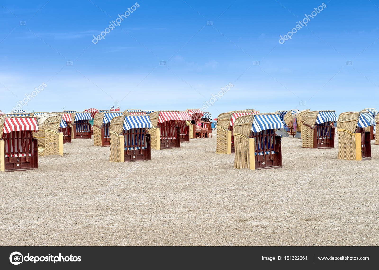 Colourful Covered Beach Chairs On A Beautiful Stock Photo