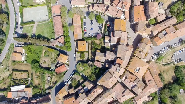 Homes of Tuscany along countryside, Italy