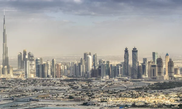 Downtown Dubai helikopter görünümünü gün batımında — Stok fotoğraf