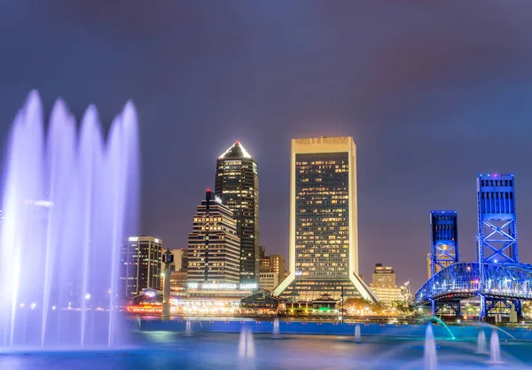Jacksonville, Florida. City lights at night with river reflectio