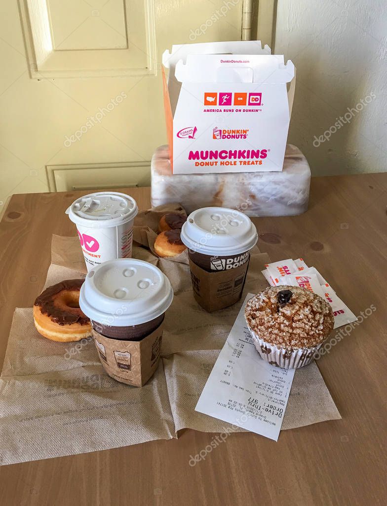 DAYTONA BEACH, FL - FEBRUARY 2016: Breakfast donuts and coffees from Dunkin' Donuts. This is a famous breakfast company in USA.
