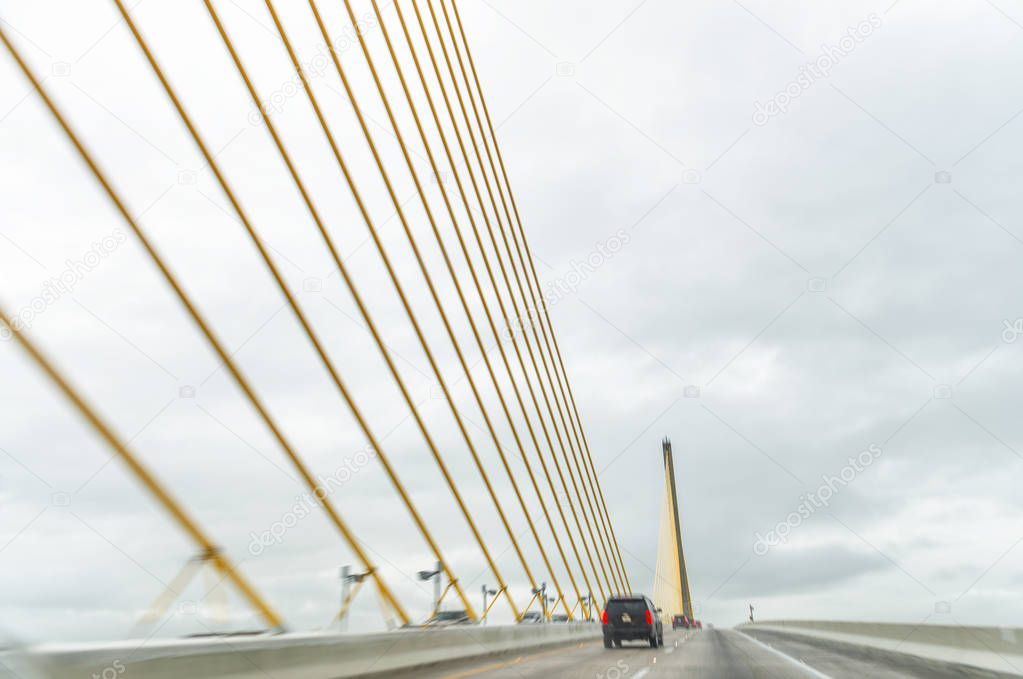 Moving cars on modern bridge