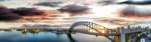 Sydney Harbour Bridge at sunset, panoramic view from the sky — Stock Photo, Image