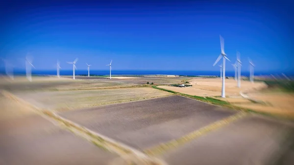 Aerial view of industrial windmills in open countryside — Stock Photo, Image