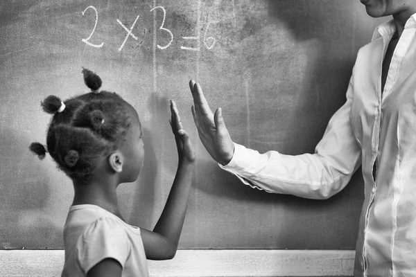 Student and teacher giving five — Stock Photo, Image