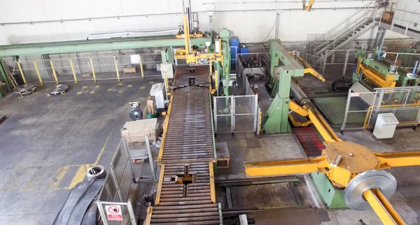 Warehouse industrial coils. Large long racks — Stock Photo, Image