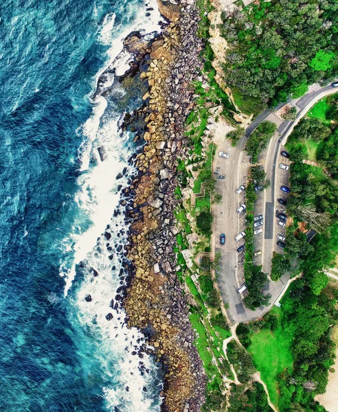 Panoramic overhead view of ocean rocks